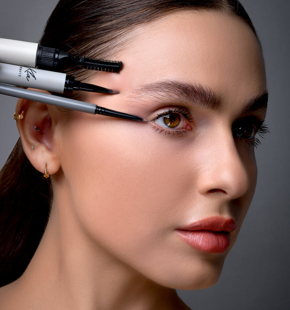Eyebrow kit tools to define and enhance eyebrows for a polished look.