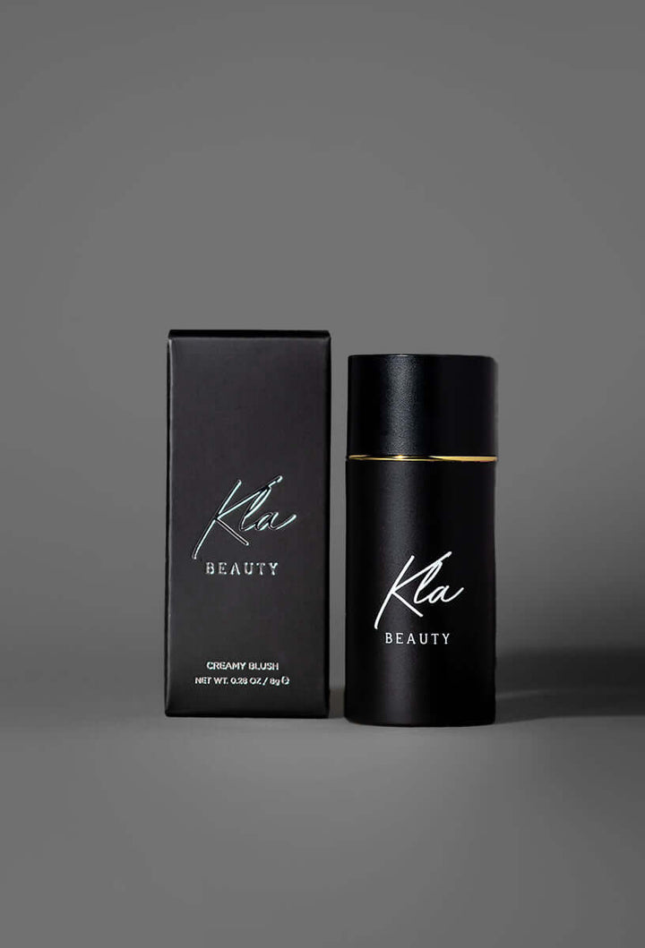 KLA Beauty Candy Rose Blush Stick in elegant black packaging, cruelty-free and vegan, enhances natural beauty with a radiant glow.