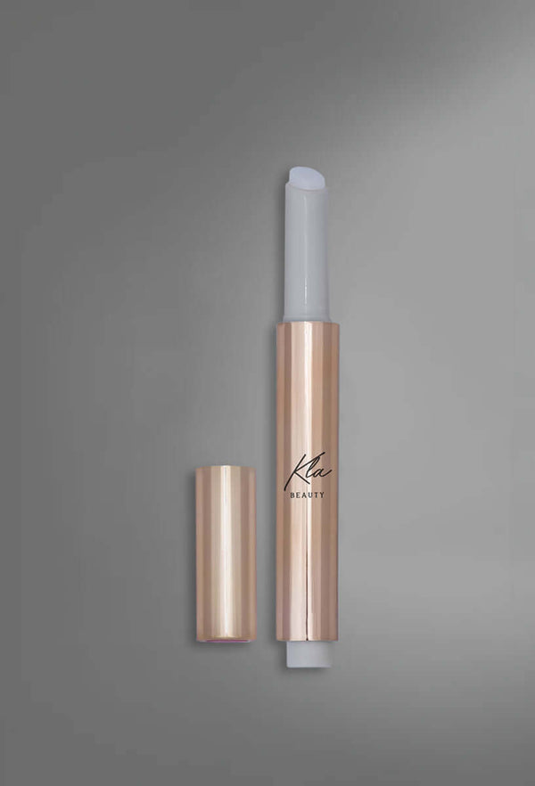 KLA Beauty Lip Balm Stick Transparent for hydrated, nourished lips, clean and paraben-free formula, enhances natural radiance.