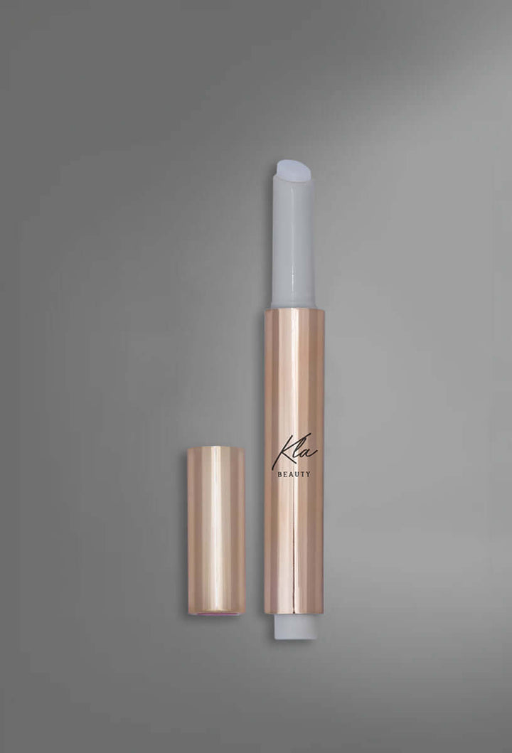 KLA Beauty Lip Balm Stick Transparent for hydrated, nourished lips, clean and paraben-free formula, enhances natural radiance.