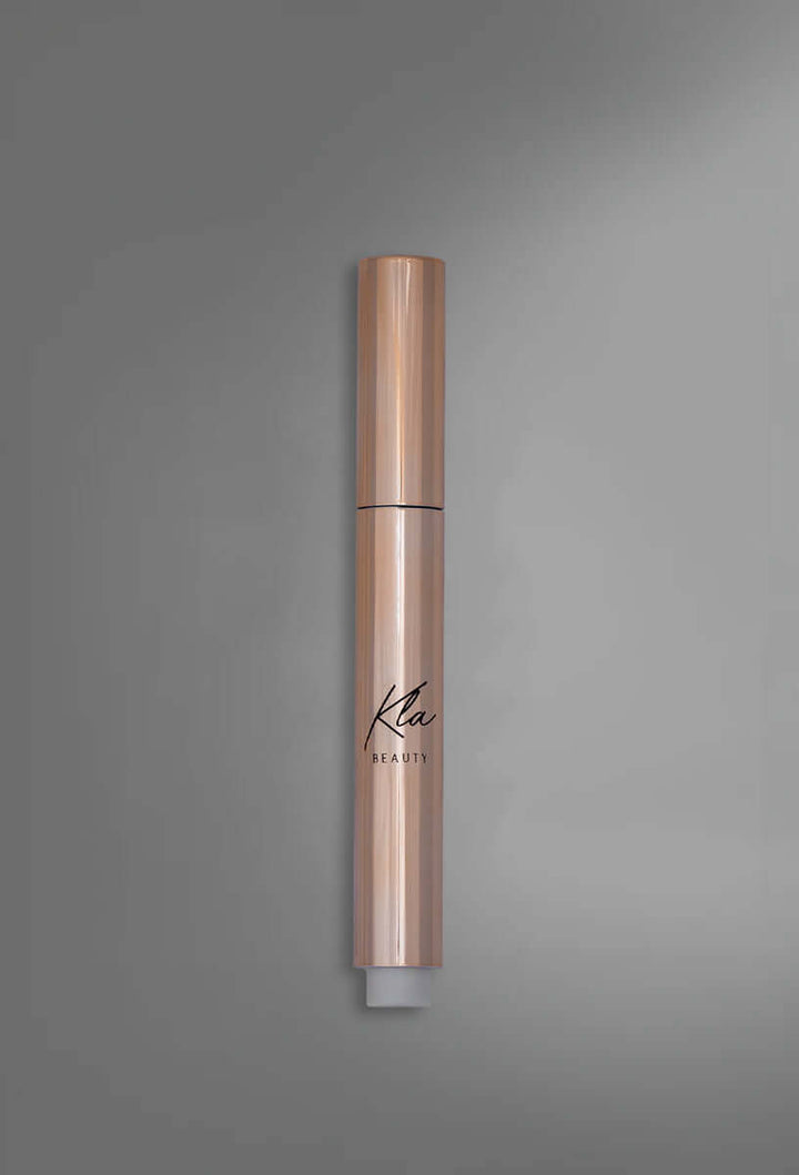 KLA Beauty Lip Balm Stick Transparent - hydrating, paraben-free formula for plump, radiant lips.