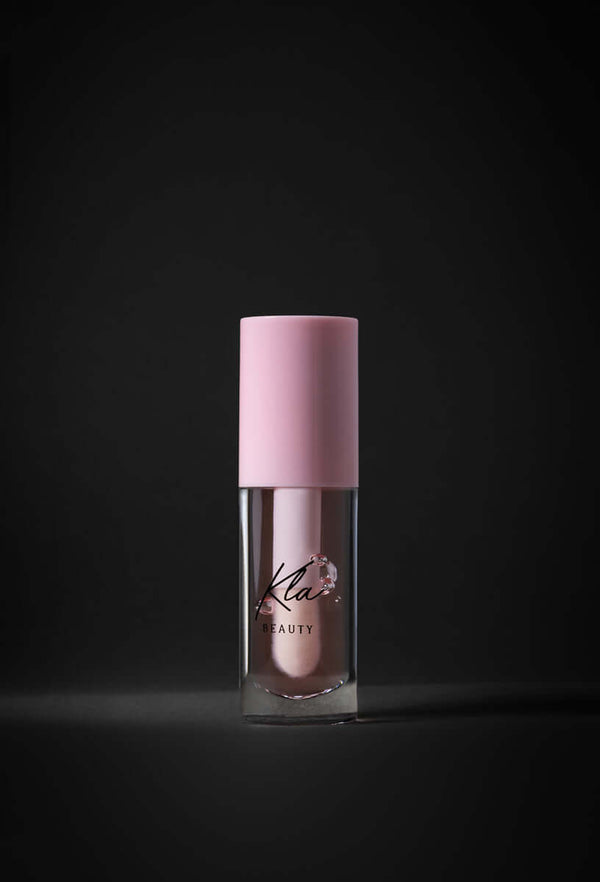 KLA Beauty Lip Oil in Transparent Pink with hydrating hyaluronic acid for glossy, vegan, cruelty-free lip care.