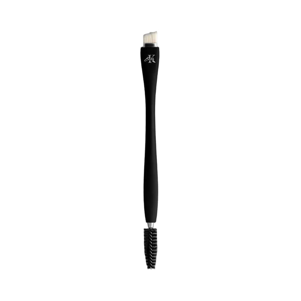 KLA-beauty double-ended eyebrow brush on a grey background for precise and flawless eyebrows.
