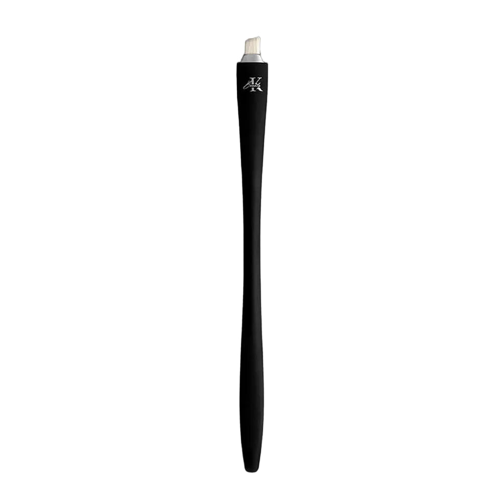 KLA-beauty sleek black eyeliner brush on gray background